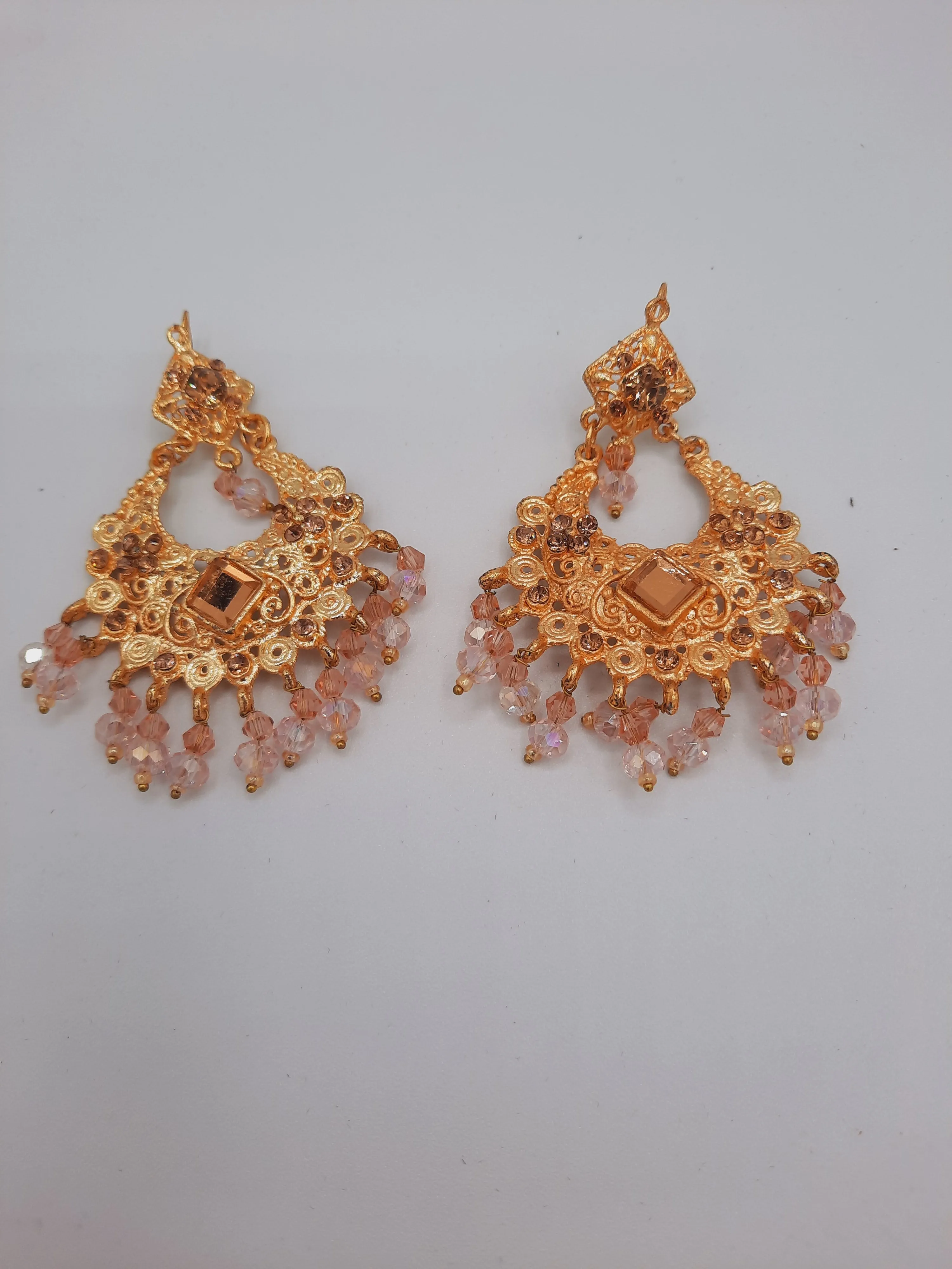 Pink guluband choker with earrings and teeka